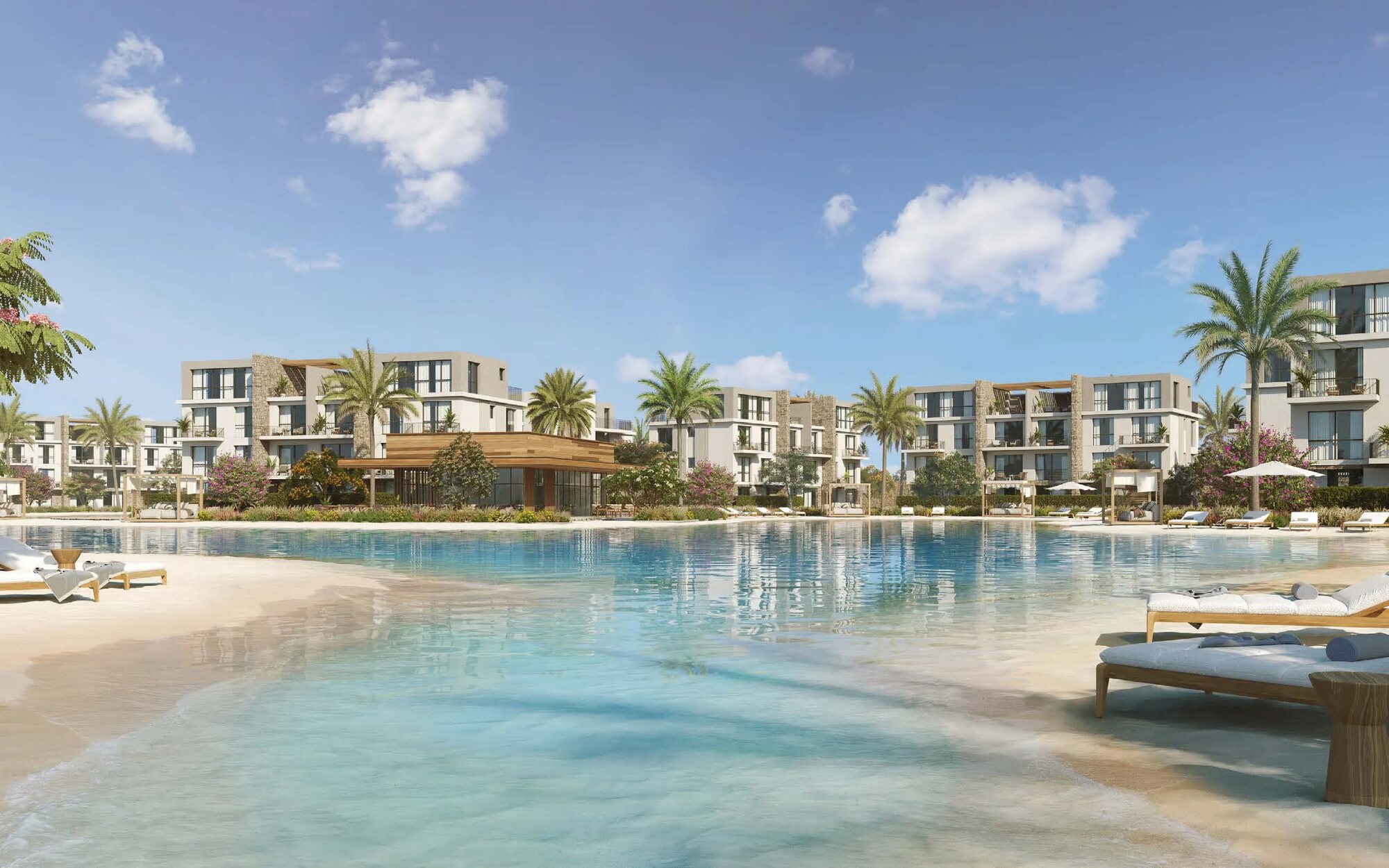 The white-sand beach meeting the crystal lagoon at Silversands