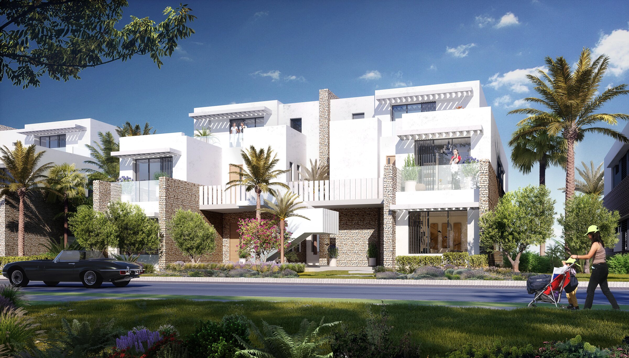 White townhouses and twin houses along a street at Silversands
